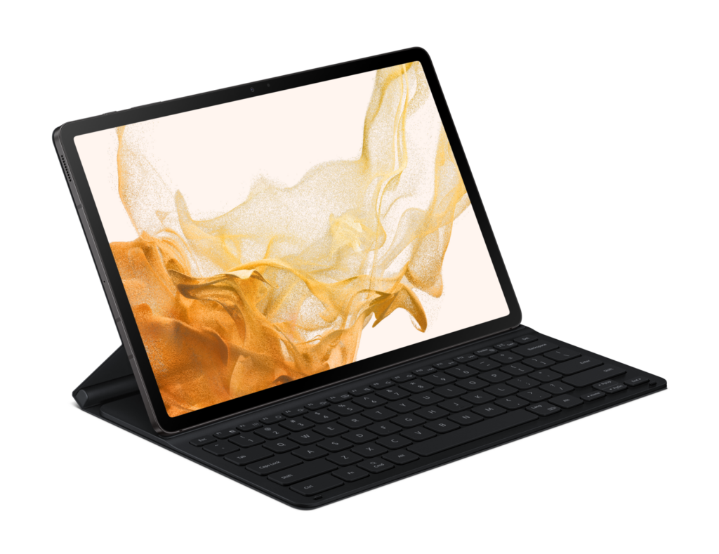 Samsung tablet med tastatur i mørkegrå, der viser gylden abstrakt baggrund